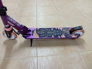 Patinete Oxelo rosa y morado