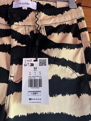 Pantalón Scalpers mujer, con estampado, nuevos.
