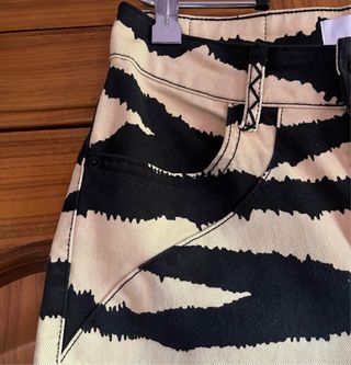 Pantalón Scalpers mujer, con estampado, nuevos.