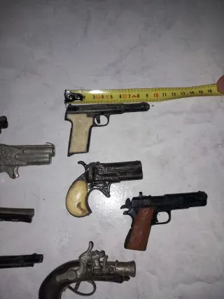 Lote 8 pistolas miniatura antiguas