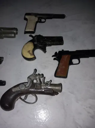 Lote 8 pistolas miniatura antiguas