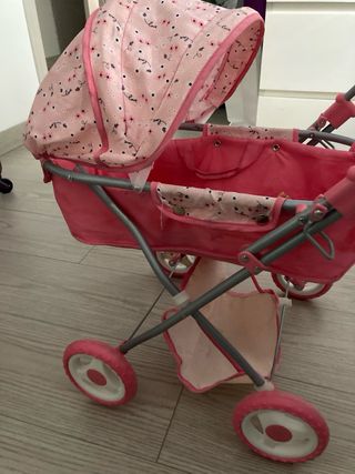 Carro de muñecas rosa