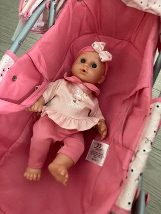 Carro de muñecas rosa