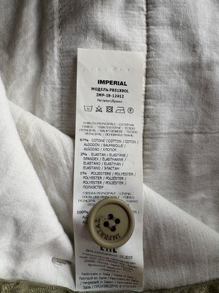 Pantaloni Imperial a righe bianche e verde oliva.