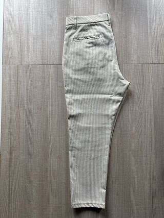 Pantaloni Imperial a righe bianche e verde oliva.