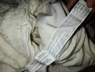 Vestido midi de tubo. ibicenco con encaje.