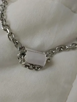 Bolso Zara metalizado plata con flecos