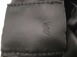 Bolso Zara metalizado plata con flecos