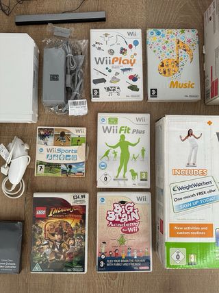 Nintendo Wii + Wii Fit Plus + Giochi