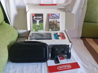 Nintendo Switch + Accesorios y Juegos