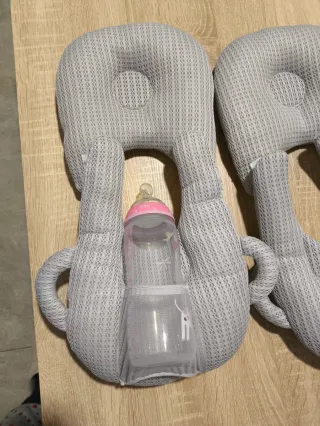 Almohada para bebé biberones