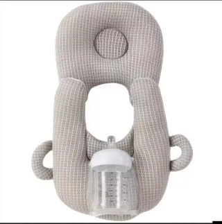 Almohada para bebé biberones