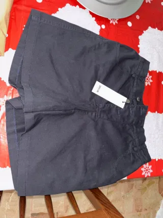 Gonna di jeans a pieghe con cintura