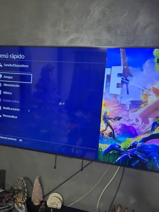 PS4 Negra con 4 mandos y 15 juegos