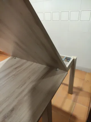 Taula de menjador extensible.
