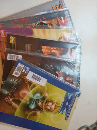 6 X-men volúmenes + 30 grapas de Ultimate
