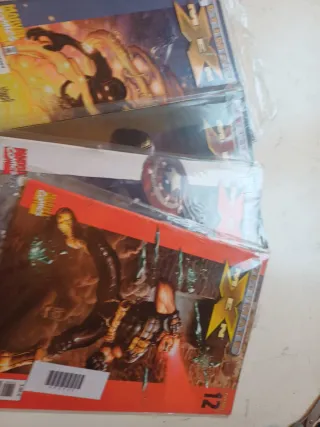 6 X-men volúmenes + 30 grapas de Ultimate