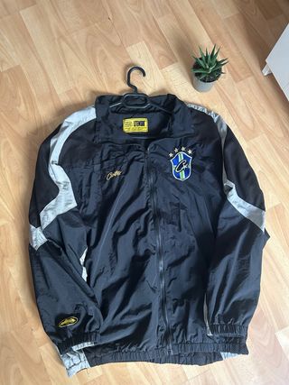 Cortavientos Corteiz x Brasil Negro/Gris