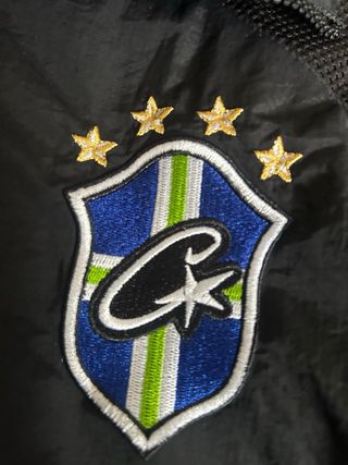 Cortavientos Corteiz x Brasil Negro/Gris