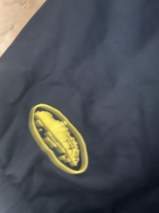 Cortavientos Corteiz x Brasil Negro/Gris