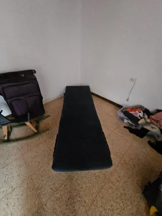 Silla convertible en cama azul