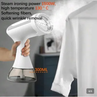 Plancha de vapor portátil sin apenas uso. Viaje