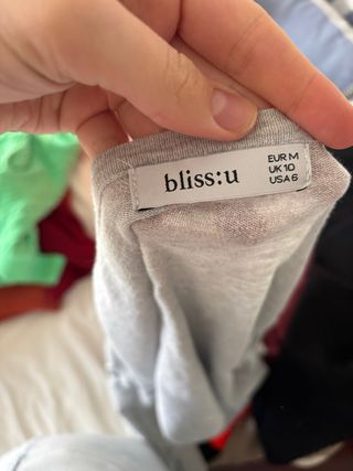 Jersey gris con lazos en mangas Talla M