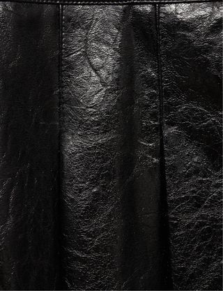 Minifalda efecto piel Mango