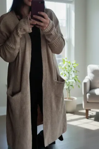 Cardigan lungo beige con tasche