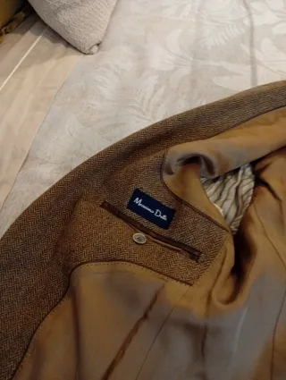 Americana tweed con coderas