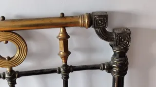 Cabecero de forja y latón