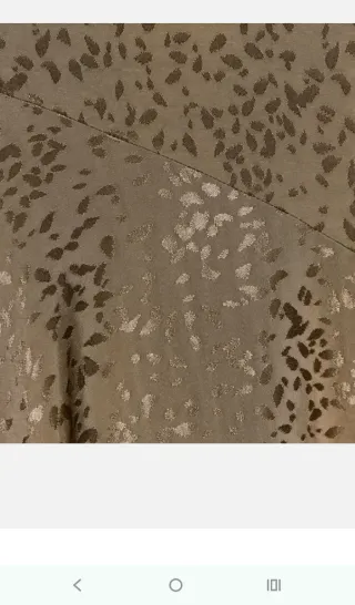 Falda Zara dorada estampada