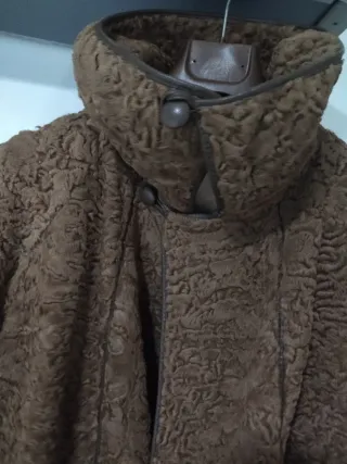 Cappottino reversibile Astrakan e montone