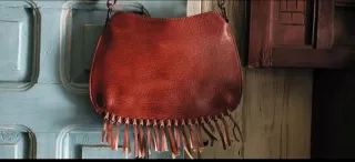 Bolso marrón de piel sintetica con flores de cuero