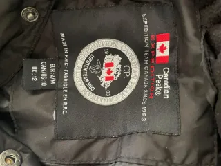 Plumas Canadian Peak Negro Talla L