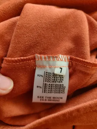 Vestido ante naranja manga larga.