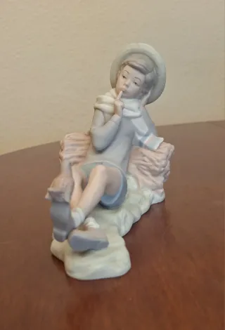 Figura Lladró Niño con Pájaro Porcelana