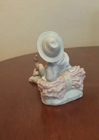Figura Lladró Niño con Pájaro Porcelana