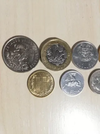 12 MONEDAS EXTRANJERAS