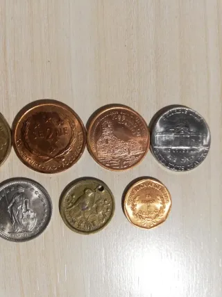 12 MONEDAS EXTRANJERAS