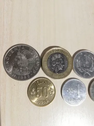 12 MONEDAS EXTRANJERAS