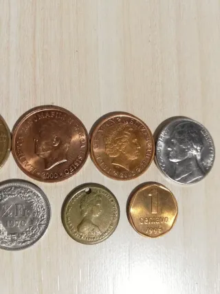 12 MONEDAS EXTRANJERAS