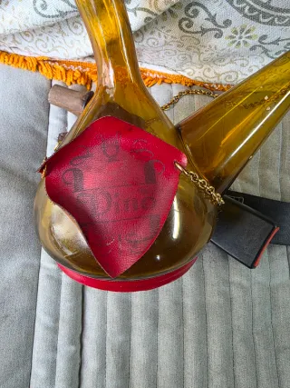 botijo antiguo con caja musical