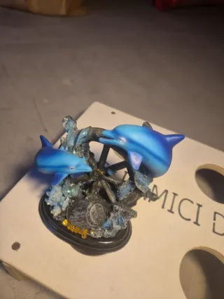 Statuina delfini con timone