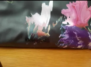 Bolso Desigual floral negro y multicolor