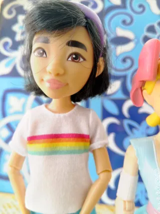 Tre bambole Disney: Toy Story, Wish, Fei Fei