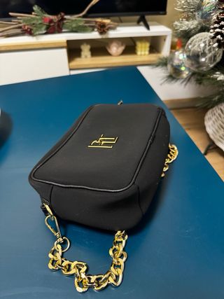 Borsa Paola Tienforti nera con dettagli oro