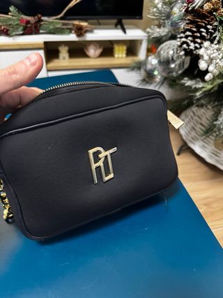 Borsa Paola Tienforti nera con dettagli oro