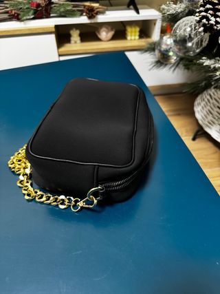 Borsa Paola Tienforti nera con dettagli oro