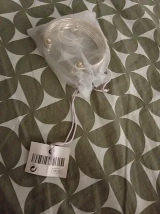 Conjunto pulsera y anillo plateados